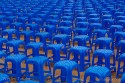 Rows of Blue Plastic Stacking Stools